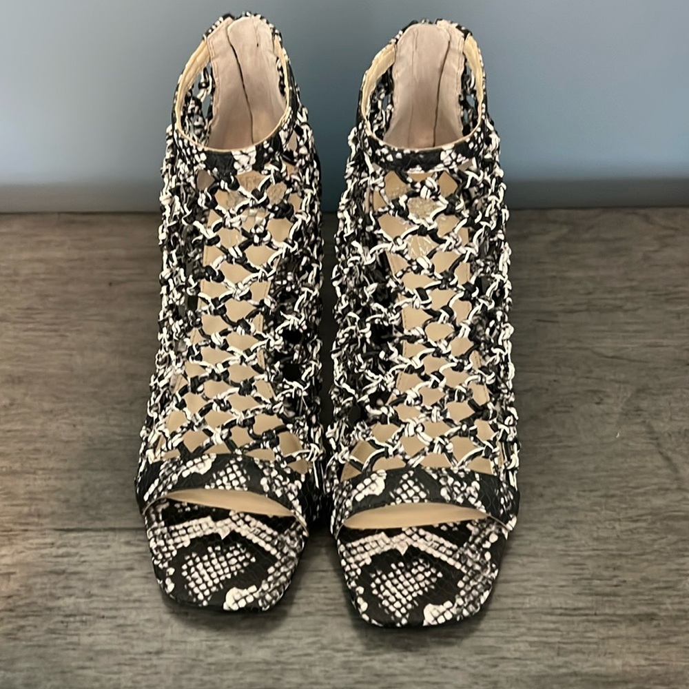 Vince Camuto Black and White Mules with Intricate Design